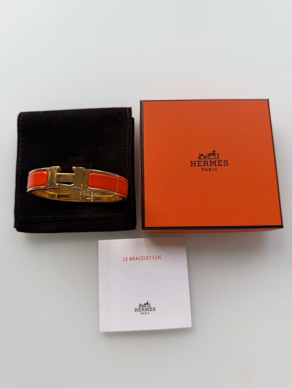 Hermès Clic H PM Bracelet Orange & Gold